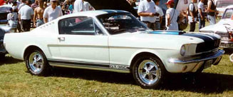 Photo of light green 1965 Shelby Mustang GT350 at a car show